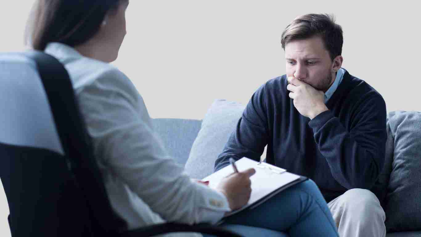 A young man talking to his therapist