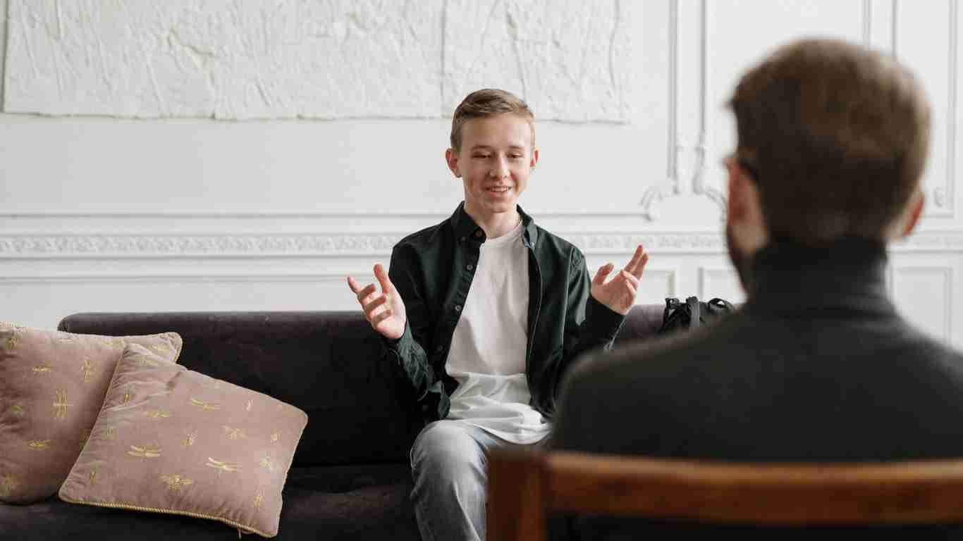 A young man talking to his therapist